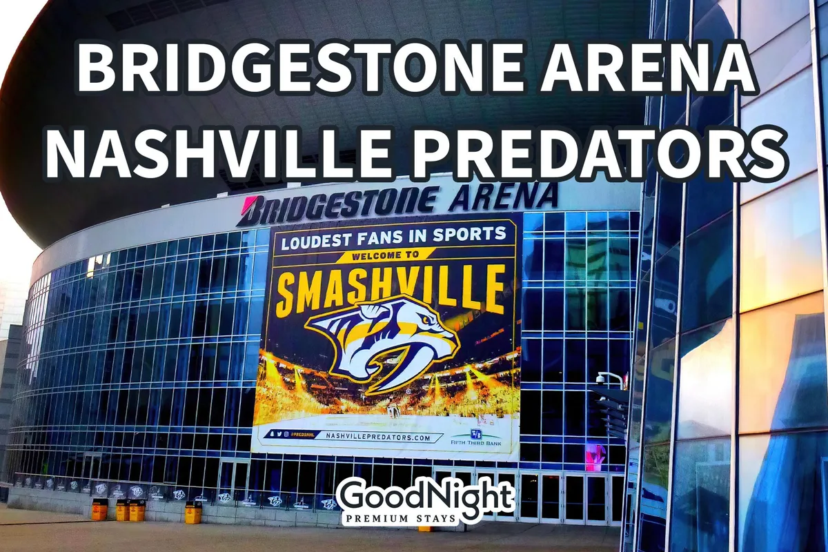 The iconic Bridgestone Arena dominates the streetscape with its welcoming banners and Nashville Predators logo. The area is alive with anticipation for events, concerts, and games, representing a central gathering place for entertainment.