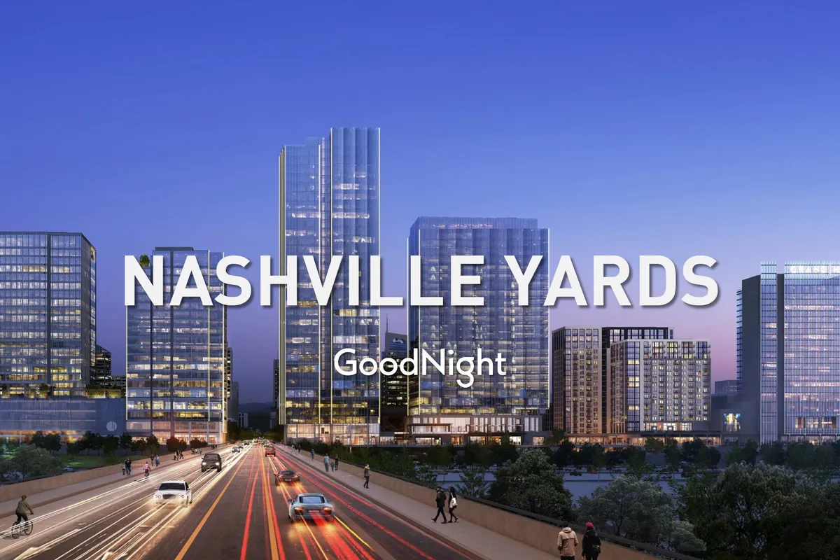 A lively cityscape featuring modern skyscrapers and a busy street scene that captures the energetic pulse of downtown Nashville. The skyline view hints at easy access to urban amenities and business opportunities.