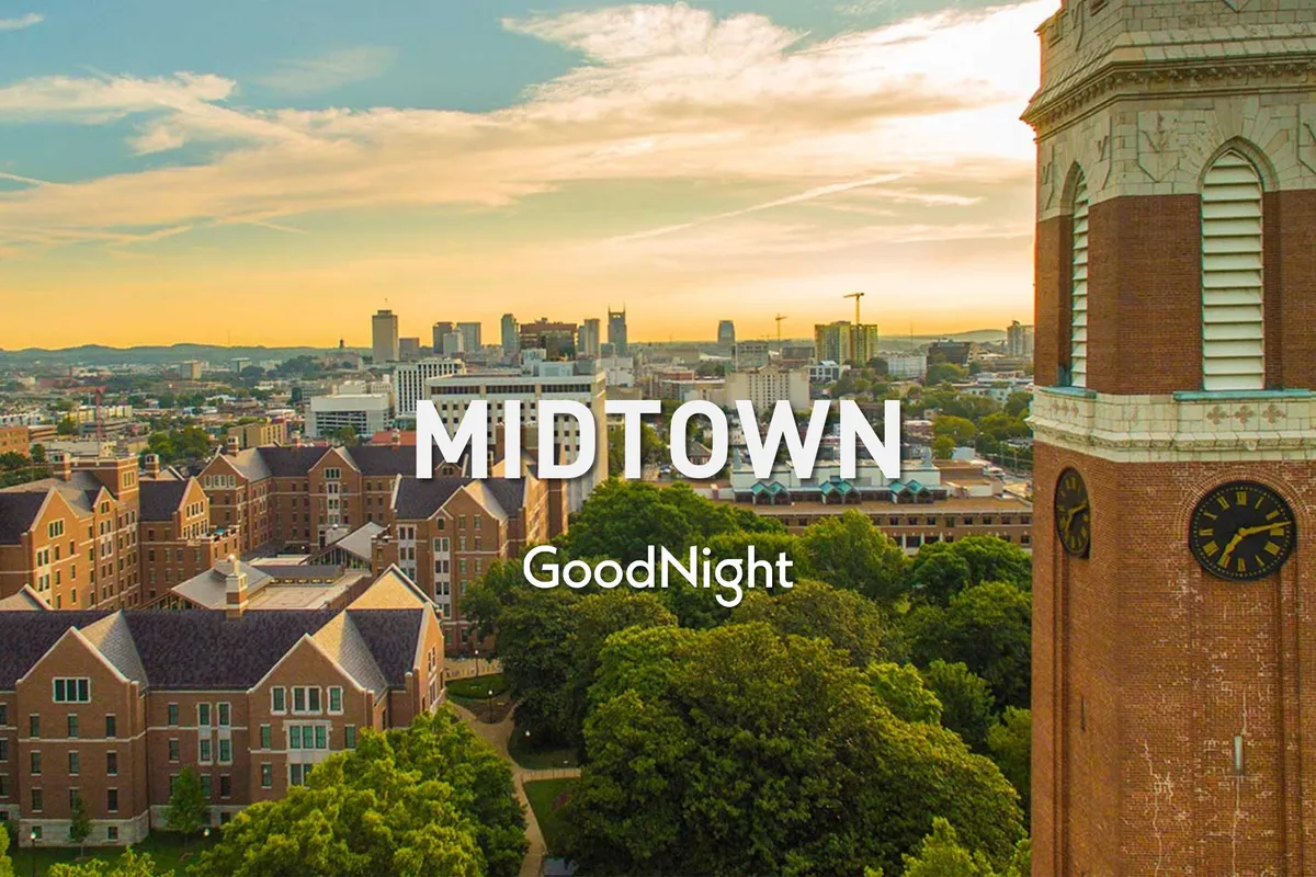 A serene view of Midtown’s skyline featuring historic buildings, a clock tower, and green trees. The scene suggests leisurely strolls, relaxation, and exploration in a beautiful urban-neighborhood setting.